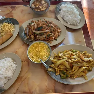 Mongolian and curry onion chicken, small egg drop soup and small sweet and sour soup and egg rolls