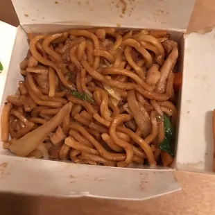 a take out box of noodles