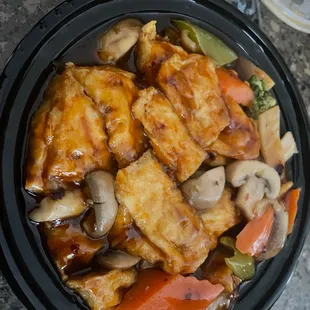 a bowl of chicken and vegetables