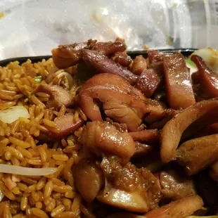 a plate of food with rice and mushrooms