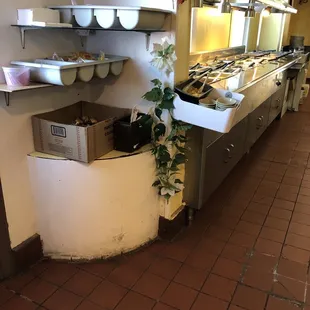 a kitchen with pots and pans