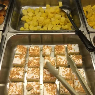a variety of food items in a buffet