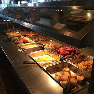 a buffet with many different types of food