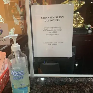 a bottle of hand sanitizer on a counter