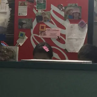 My waitress could barely see over the counter!  She's sweet and as efficient as any adult.