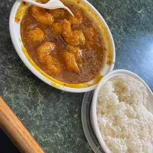 a bowl of rice and a bowl of stew