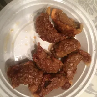 This is what they consider pan Fried dumplings. I called to complain and,was met with attitude. One word. DISGUSTING.