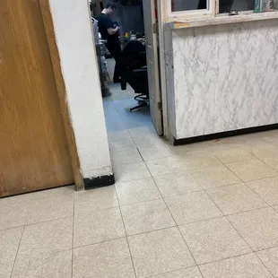 a man standing in a kitchen