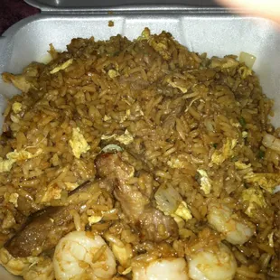 House fried rice... Large amount and def get your money worth ... Nice Lil cozy Mom and Pop joint...
