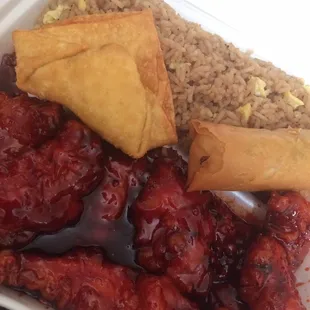 General Tso&apos;s Chicken lunch special with a side of Crab Rangoon (only one pictured, an order is about 6-8)