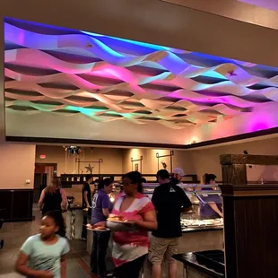 a group of people in a restaurant