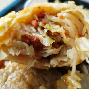 Specks of pork in the egg roll.