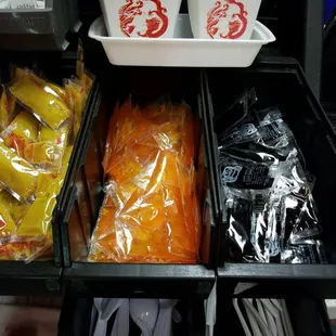 a variety of food items in plastic containers