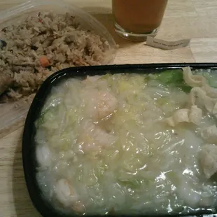 a meal of rice, meat, and vegetables