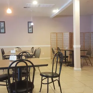 dining area with tables and chairs
