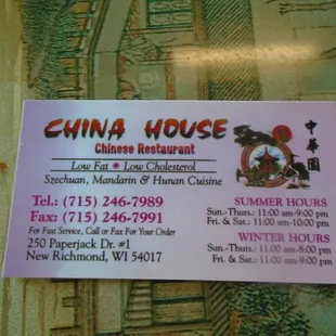 Business card with contact info.