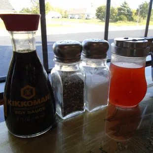 Condiments on each table - you'll need 'em for your bland food!