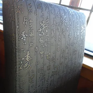 What does the writing on the chairs say?  Insert your own comment!