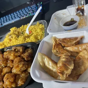 Pork dumplings and orange chicken with fried rice!