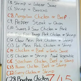 a menu on a white board