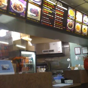 menus on the wall of the restaurant