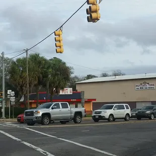 The restaurant is at a very busy intersection.