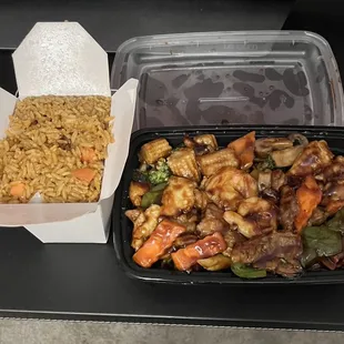 a container of food and a container of rice