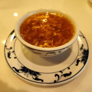 a bowl of soup on a plate