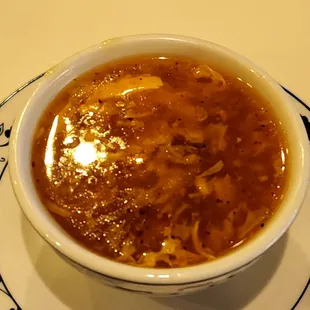 a bowl of soup on a plate