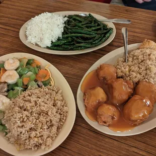 three plates of food on a table