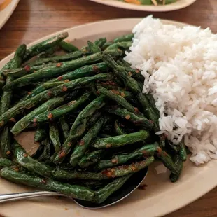 a plate of green beans and rice