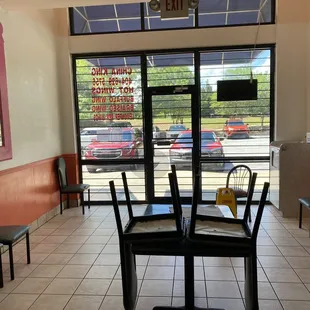 empty chairs and tables in a restaurant