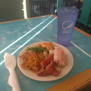 a plate of food and a drink