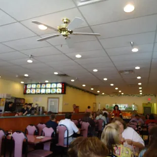 Inside the shop, so many people enjoy eating