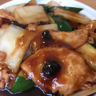 a plate of food with meat and vegetables