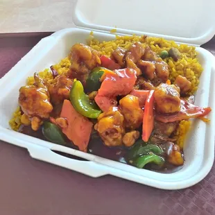 Orange Chicken lunch. Crispy spicy with carrots and green peppers.