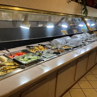 a buffet with a variety of food items