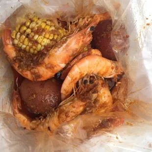 Half Pound Cajun Head on Shrimp ( comes with 2 potatoes and one corn)