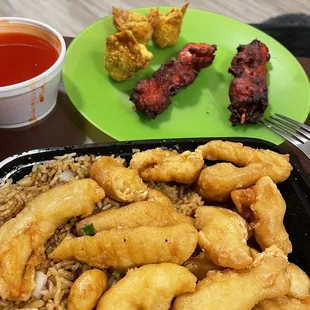 fried chicken and rice with dipping sauce