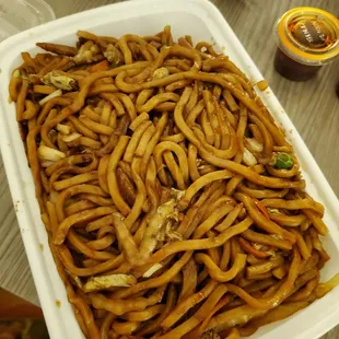 a large white container of noodles