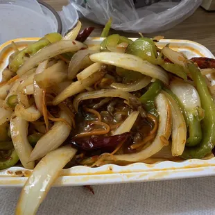 a plate of stir fried vegetables