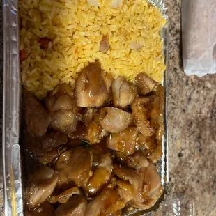 chicken, rice, and vegetables in a container