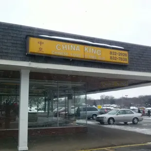 cars parked in front of the building
