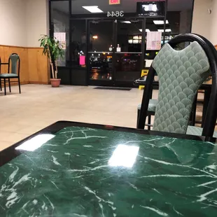 a table and chairs in a restaurant
