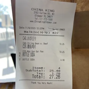 a receipt on a paper bag