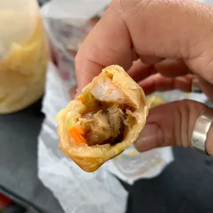 Inside of the fried shrimp spring rolls. House-made. Very good. Has mushroom, cabbage and carrots inside.
