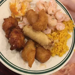 Fried rice, shrimp &amp; veggies, fried shrimp, honey chicken, General Tso's chicken, crab casserole and a spring roll. Always the best!