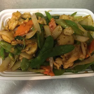 chicken and vegetables in a styrofoam container