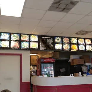 menus on the wall of the restaurant
