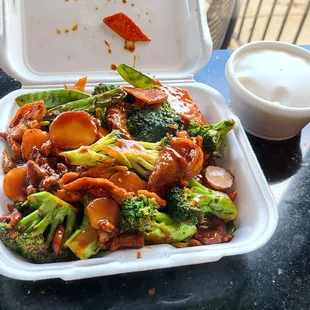 a plate of stir fried vegetables